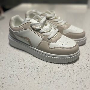 Stylish White and Tan Sneakers
